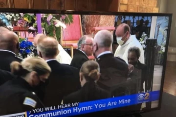 Chicago Mayor Lori Lightfoot receiving Communion